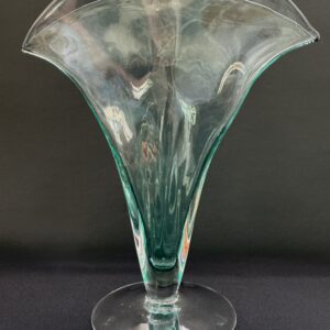 Seafoam colored Blanco fan vase on a black background