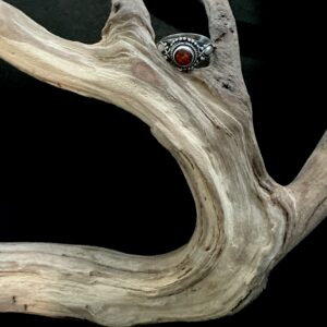Rustic silver ring with round center amber on weathered driftwood