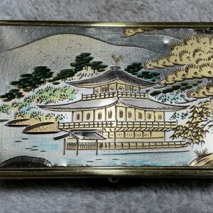 Vintage Clover Japanese musical powder compact with Kinkaku-ji temple design.